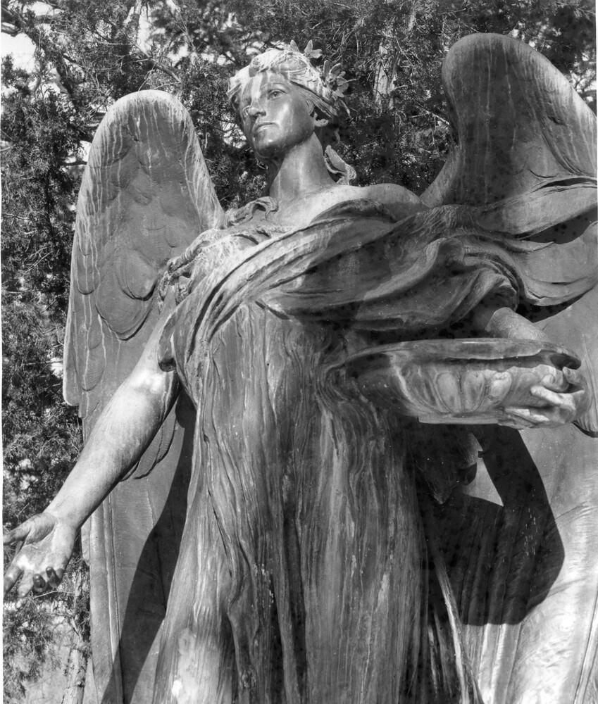 large bronze statue of angel