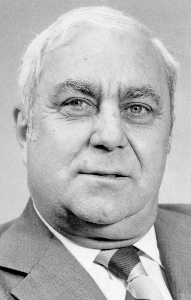 Head shot of man in suit and tie