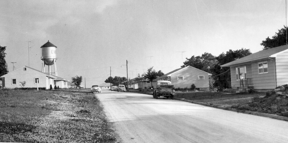Several homes along a road.