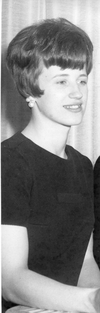 Profile of young woman with short hair