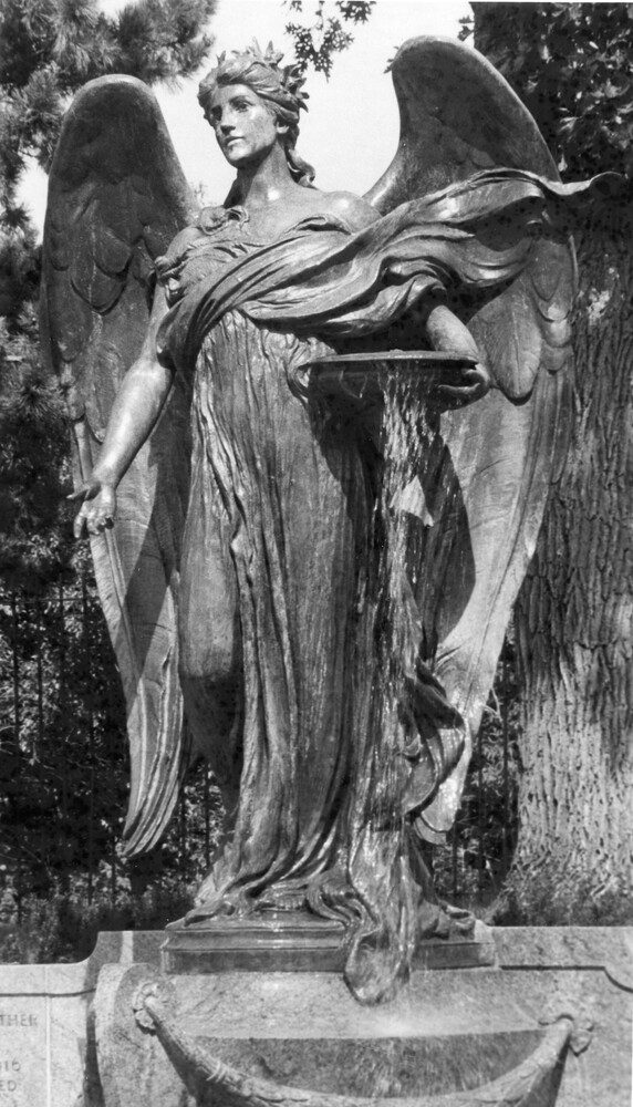 large outdoor statue/fountain of an angel
