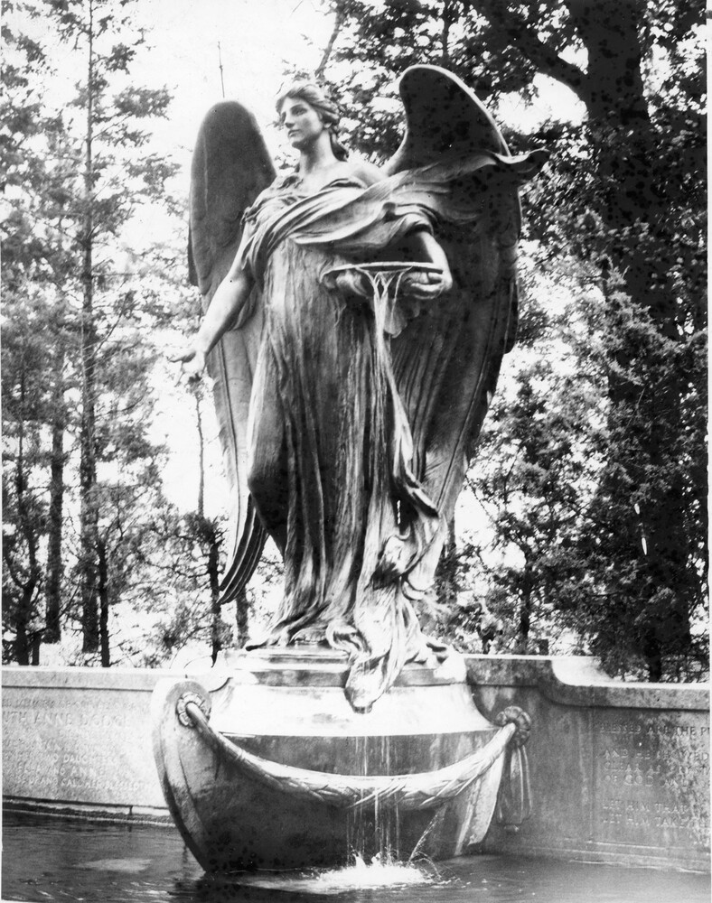 large outdoor statue/fountain of an angel
