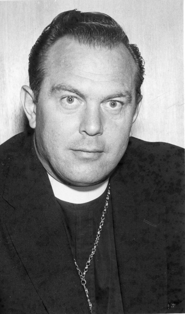 Head shot of man in clerical collar