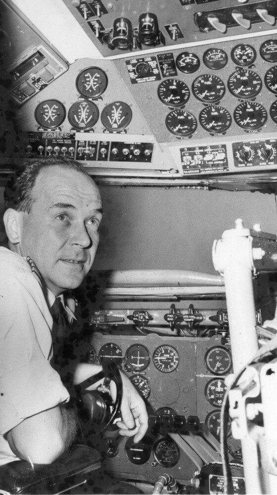 A man in a cockpit.