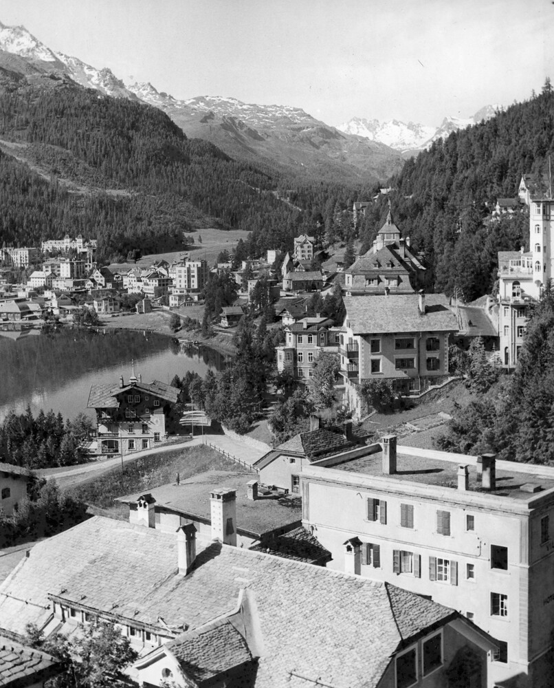 Village surrounded by mountains.