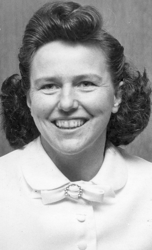 Head shot of smiling young woman