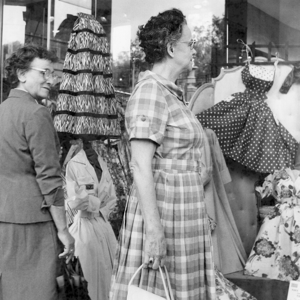 Women shopping on a street.