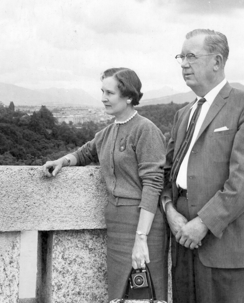 Man and woman viewing mountains.