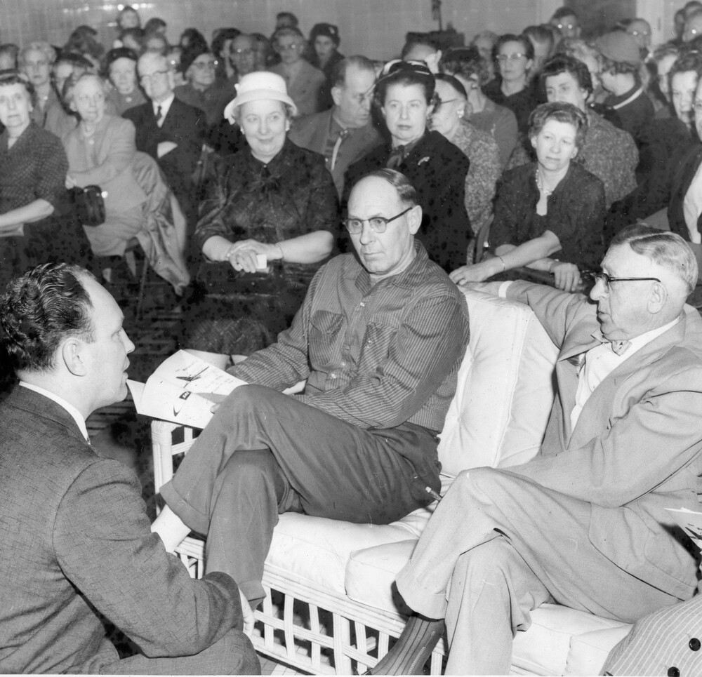 Large group of seated people.