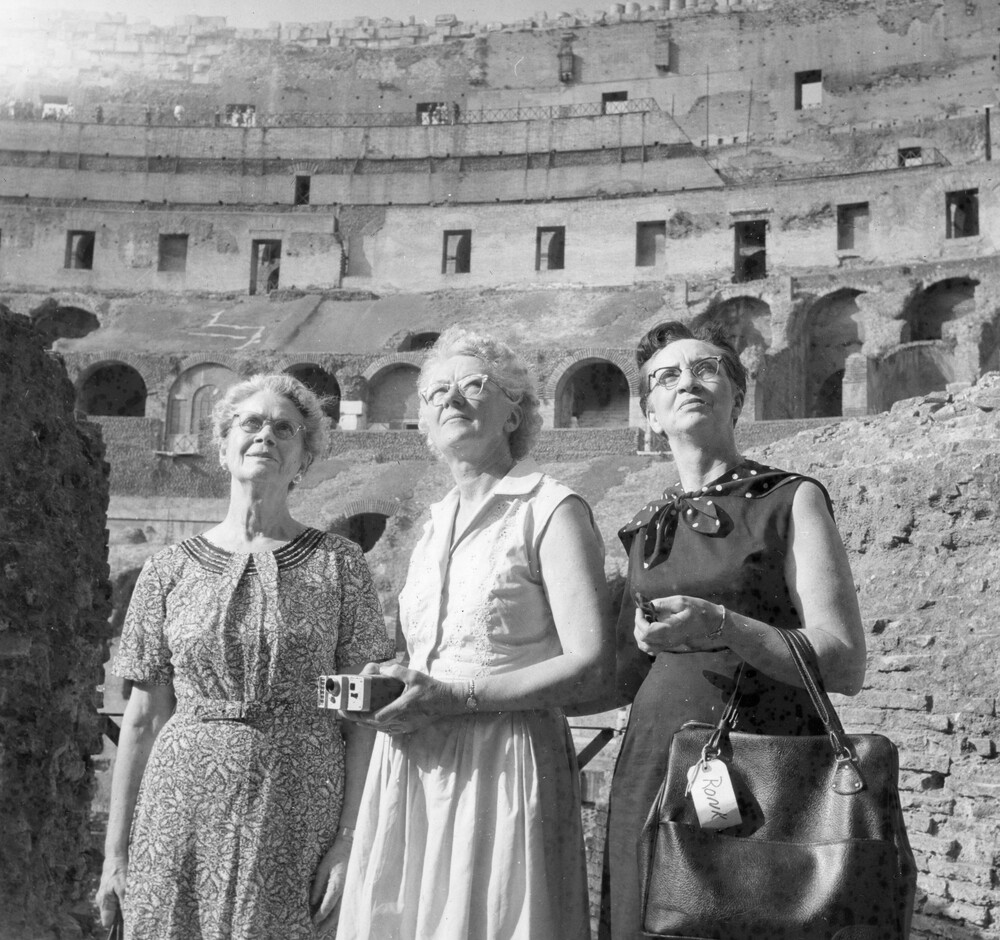 Three women looking upward.