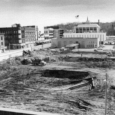 Demolition/construction site, surrounded by other city buildings