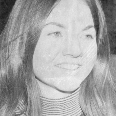 Head shot of young woman with long hair