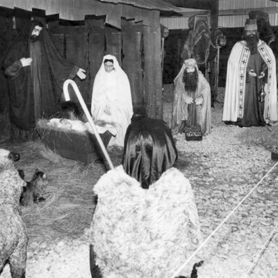 photo of nativity scene formed by life-size wax figures