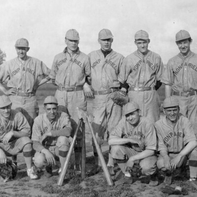 Nine posing baseball players.