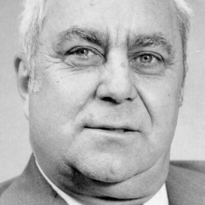 Head shot of man in suit and tie