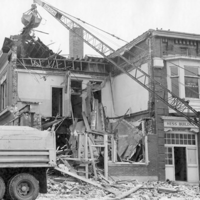 A crane demolishing a building.
