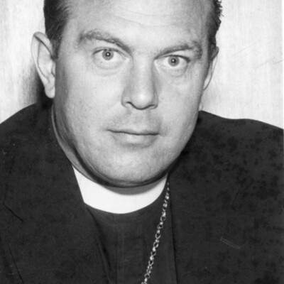 Head shot of man in clerical collar