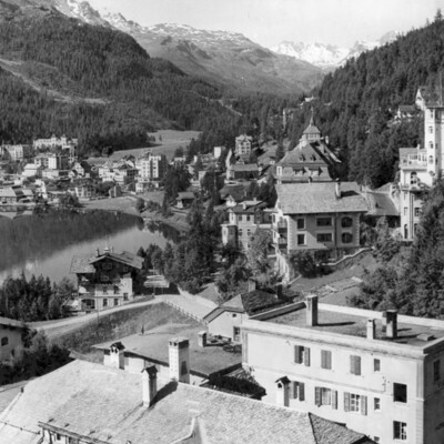 Village surrounded by mountains.