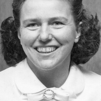 Head shot of smiling young woman