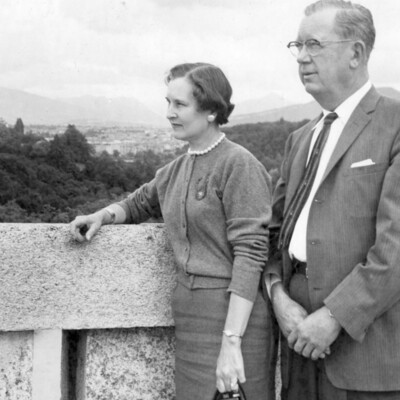 Man and woman viewing mountains.