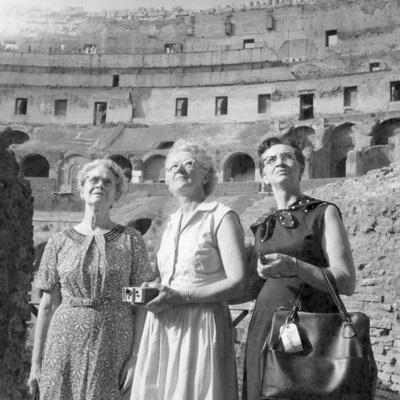 Three women looking upward.